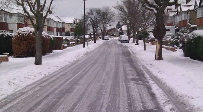 snowy neigborhood road