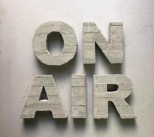 Words "On Air" made of concrete