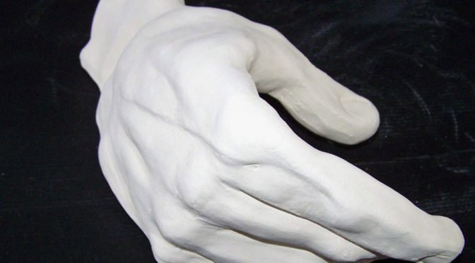 white clay hand