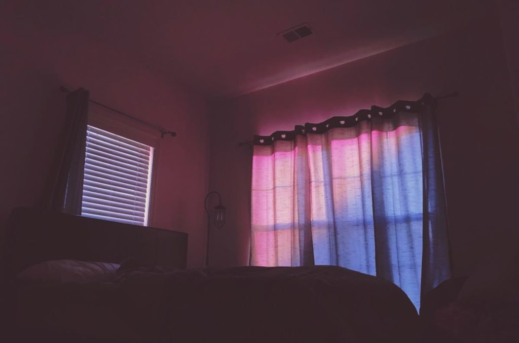 Picture of room with pinkish glow
