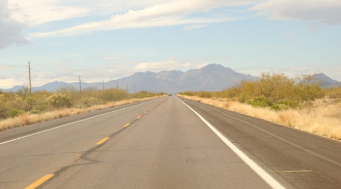 Photo of empty road, going toward mountains