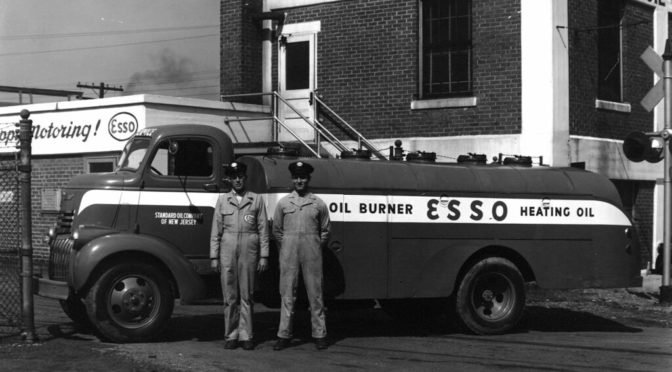 Old Standard Oil service station with two men standing out front