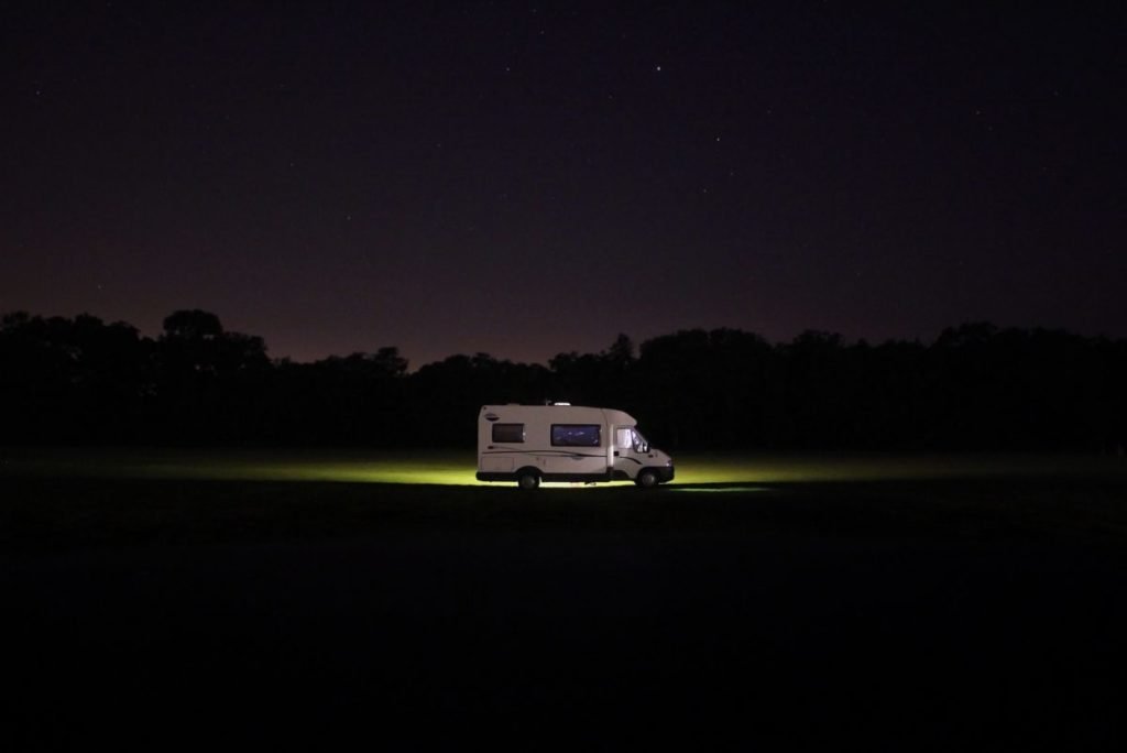Photo of RV driving in the dark