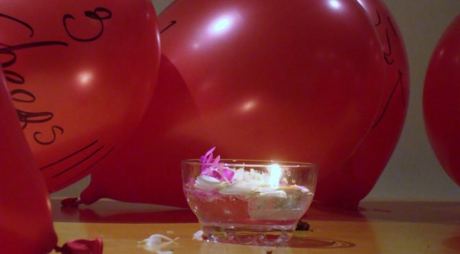Photo of balloons and candle