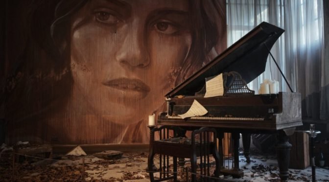 Piano in foreground, Large painting of woman in background