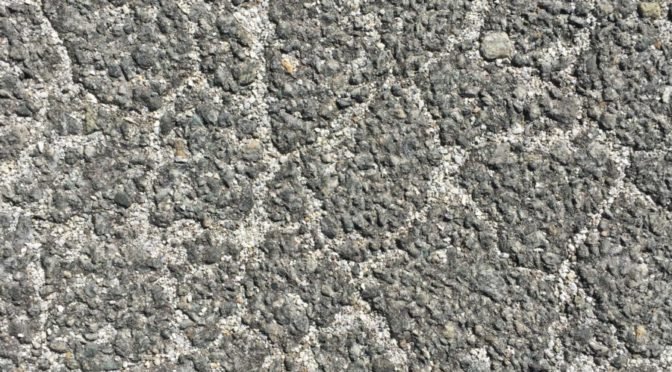 Photo of cracked asphalt