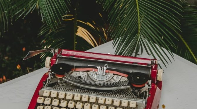 Photo of old red typewriter
