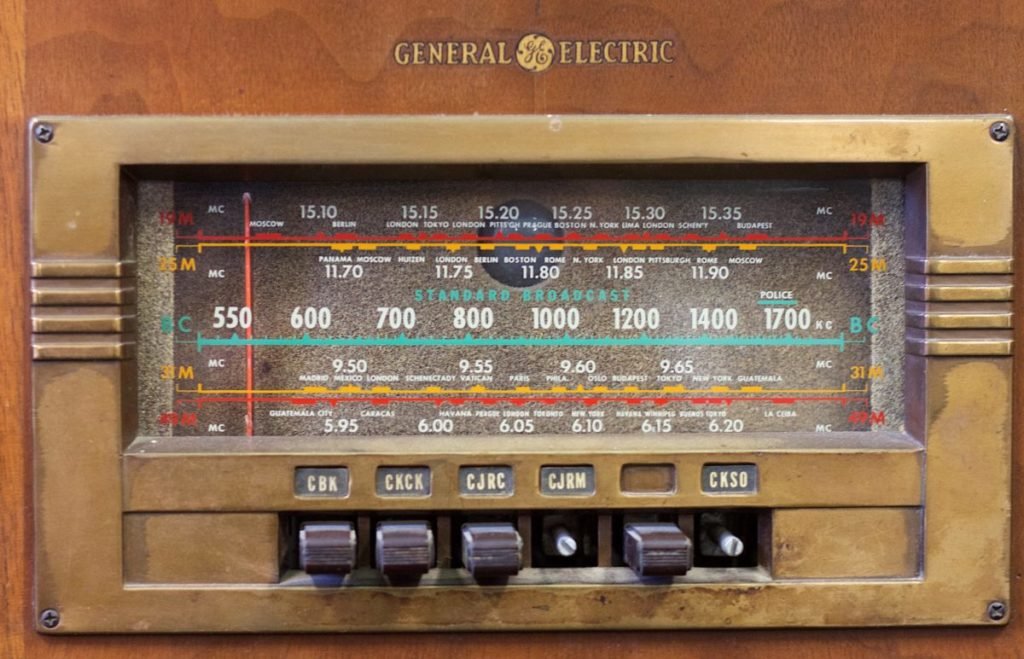 old radio with buttons and dials