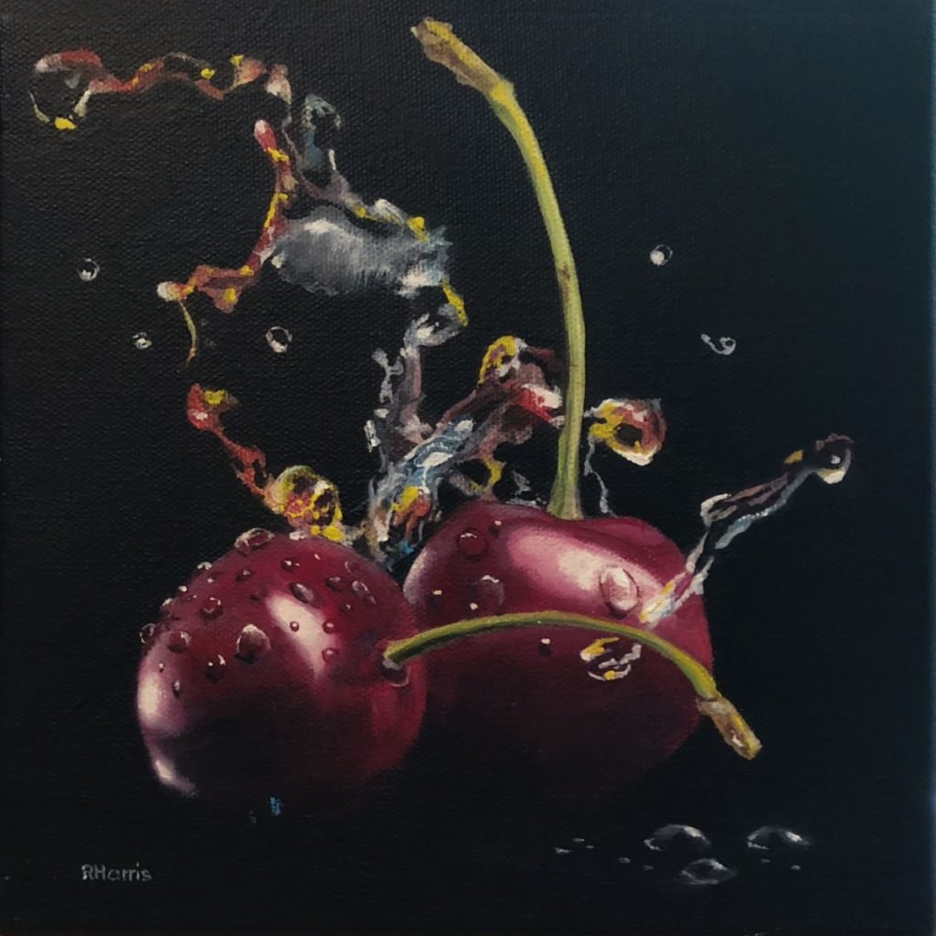 Painting of cherries splashing in water