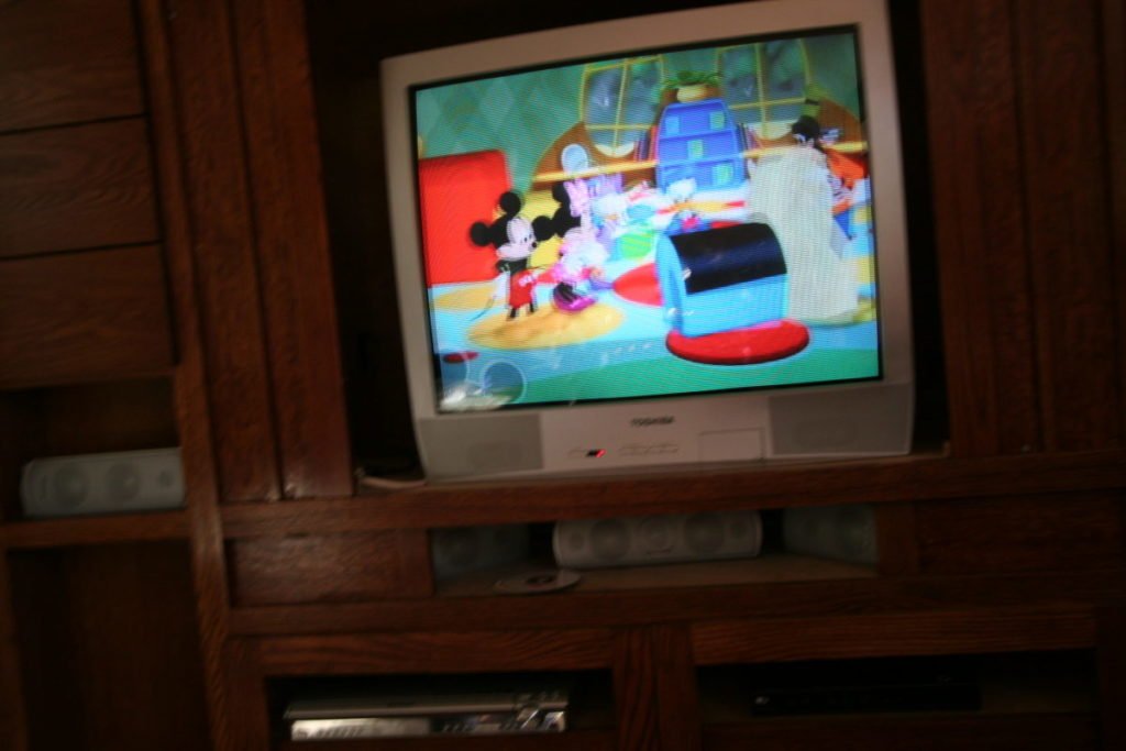 Photo of TV with cartoon playing