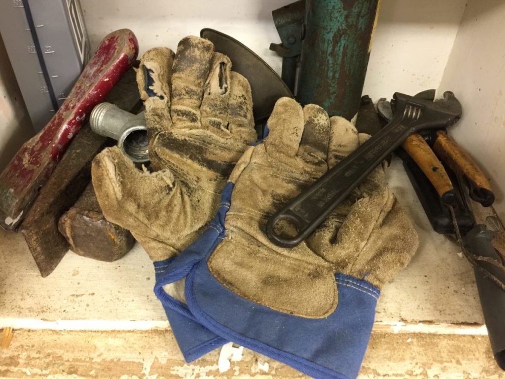 Photo of work gloves and tools