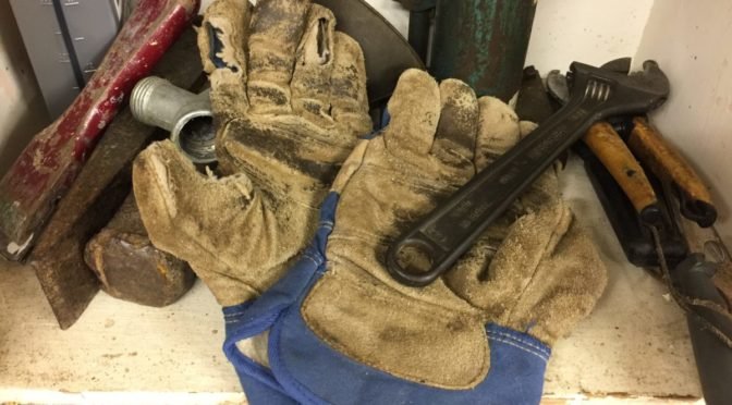 Photo of work gloves and tools