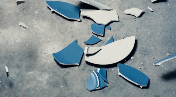 Photo of shards of broken blue dish