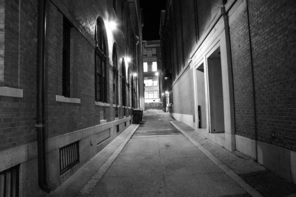 Black and white photo of alleyway