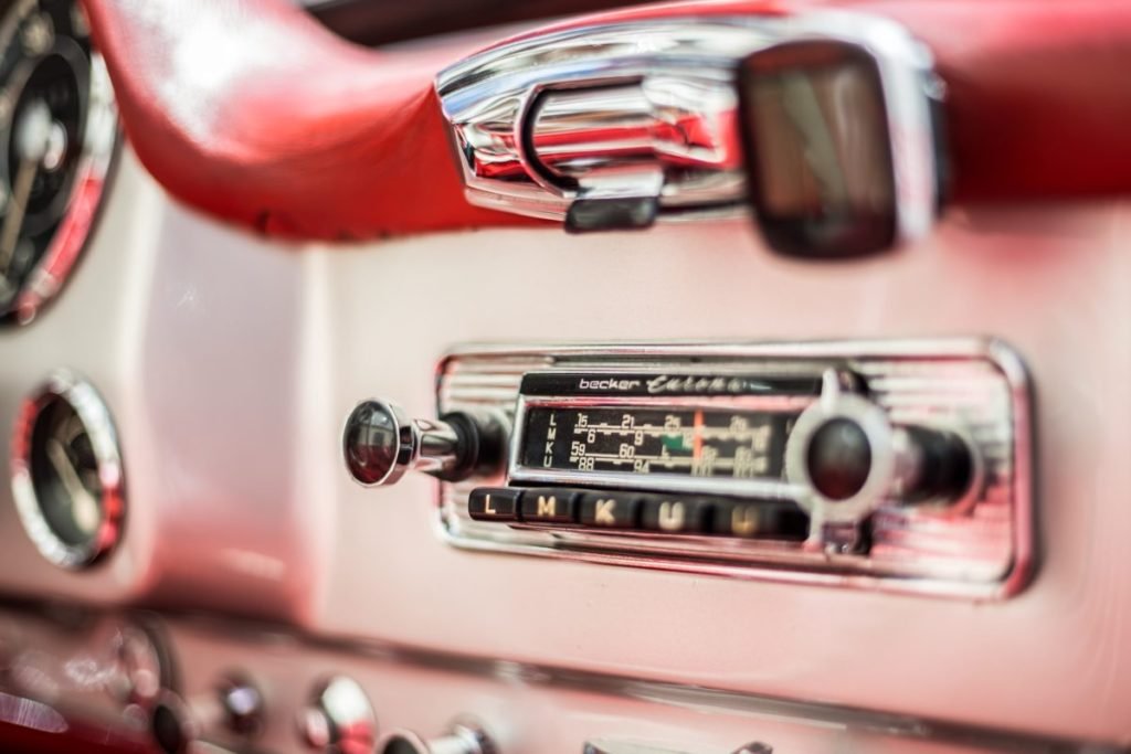 Photo of old car radio in pink dash
