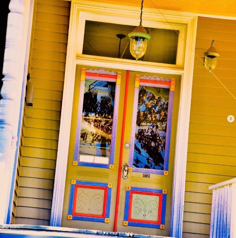Photo of brightly painted front door