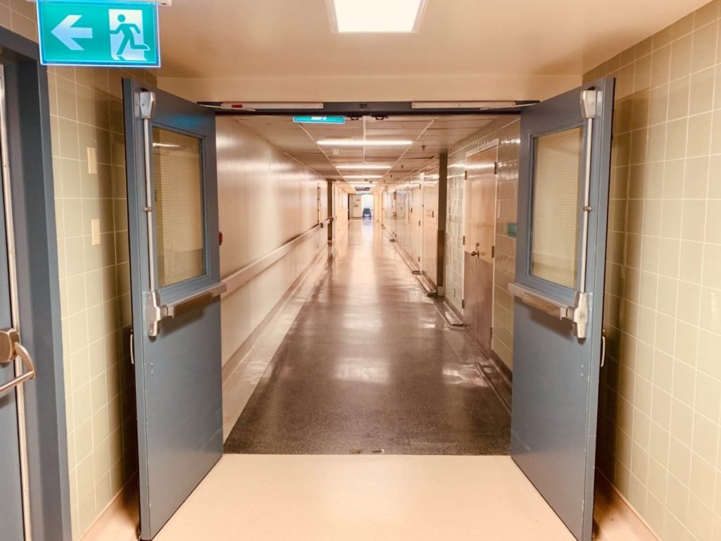 Photo of open hospital corridor doors