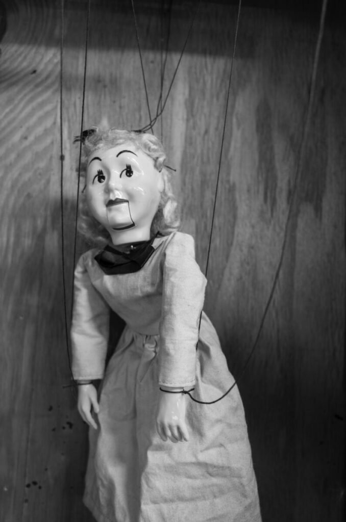 Black and white photo of marionette