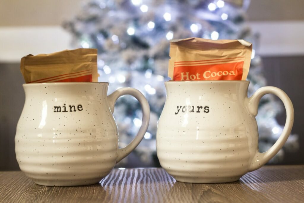 Photo of mugs that say "mine" and "yours"