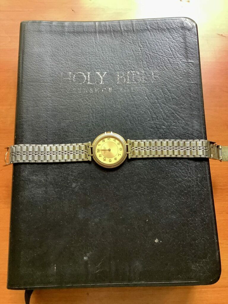 Old bible and watch