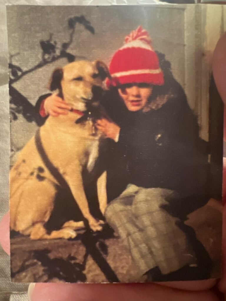Photo of young girl with dog