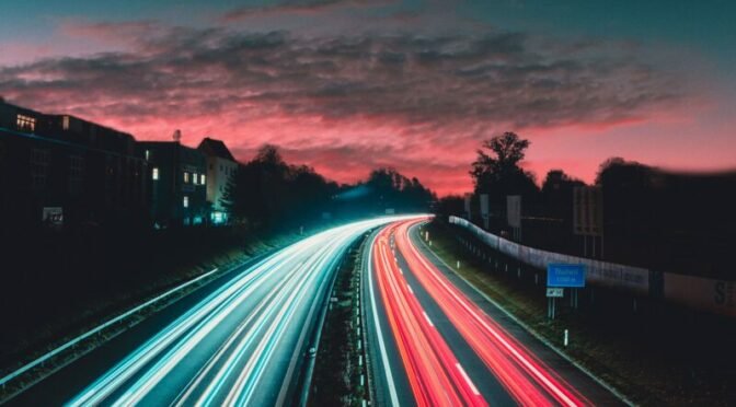 Time lapse photo of lights of cars driving on road