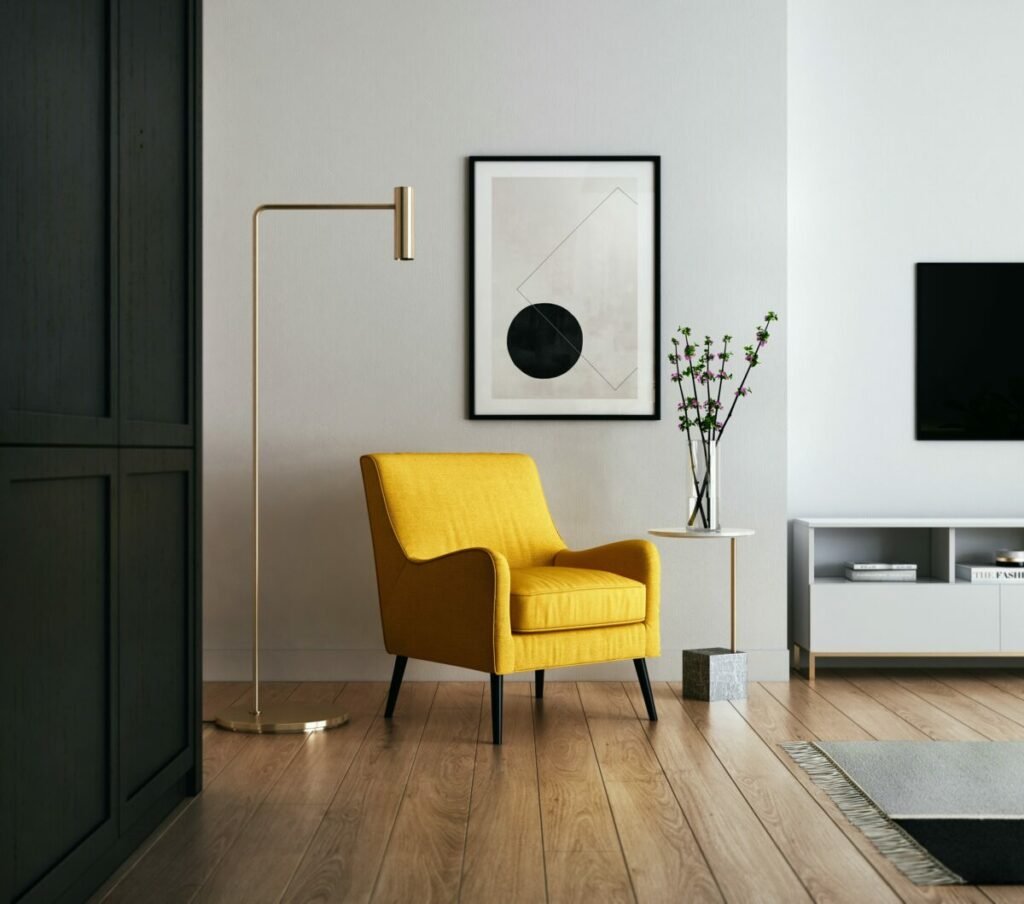 Photo of yellow chair in white room