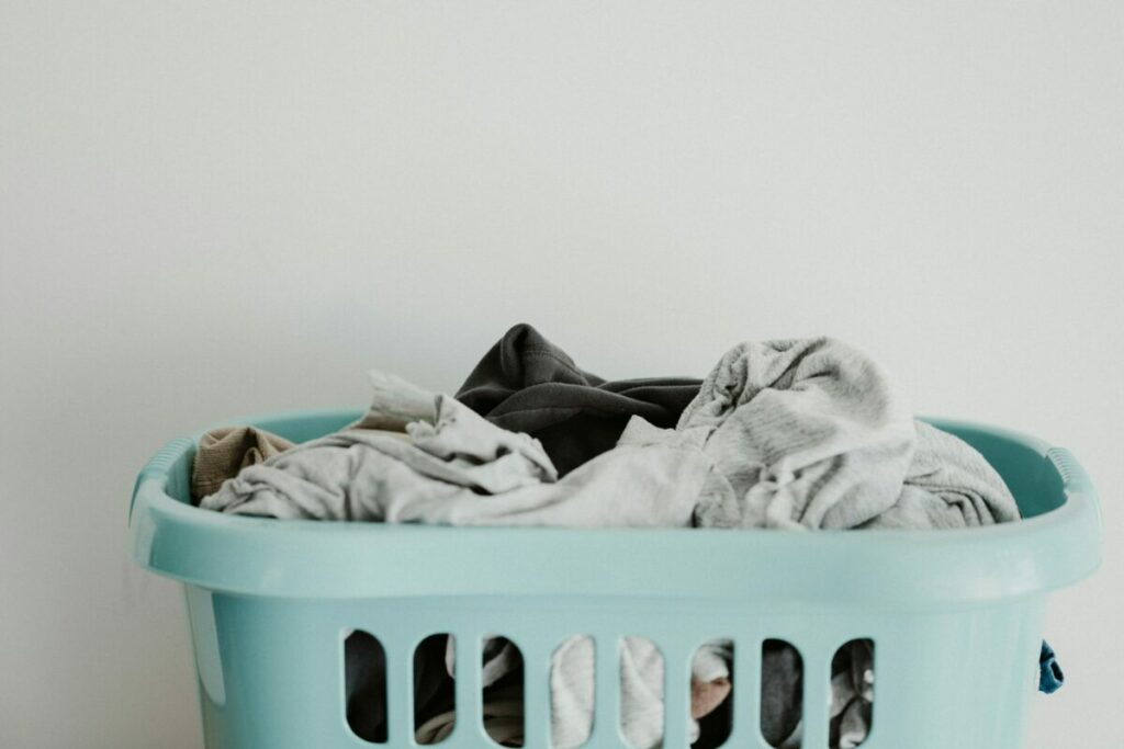 pale blue basket of laundry