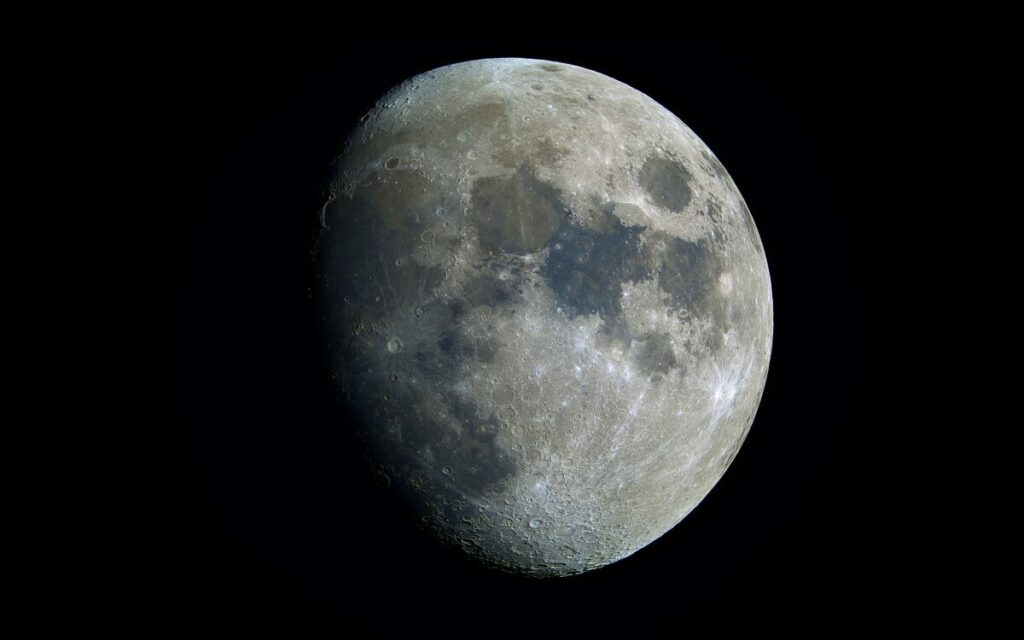 Gibbous moon in black sky
