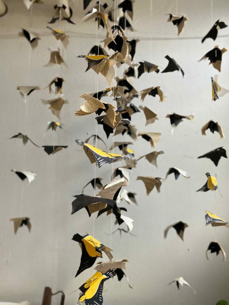 mobile of multiple paper birds