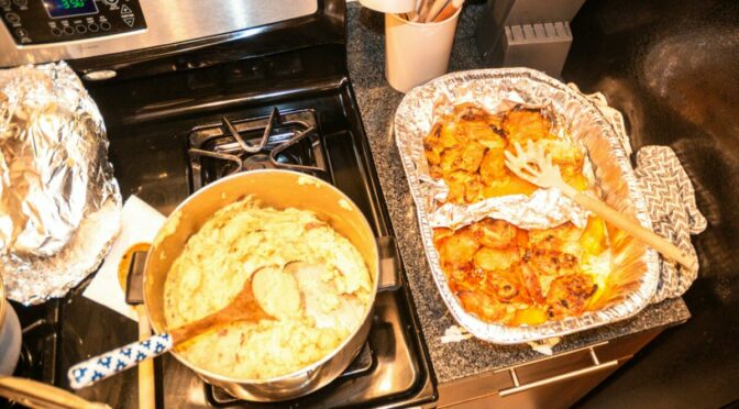 Photo of dishes served on top of stove