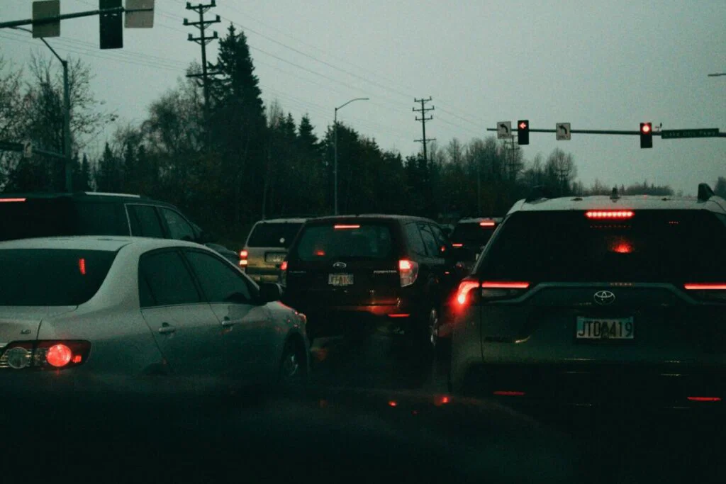 Photo of cars stopped at a red light