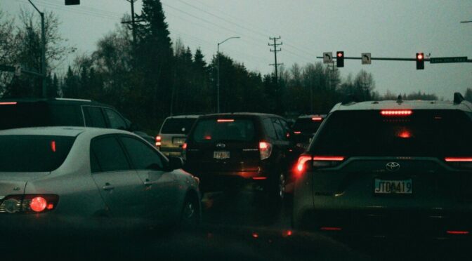 Photo of cars stopped at a red light