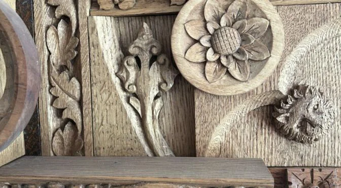 Photo of a piece of wood inlaid with floral designs