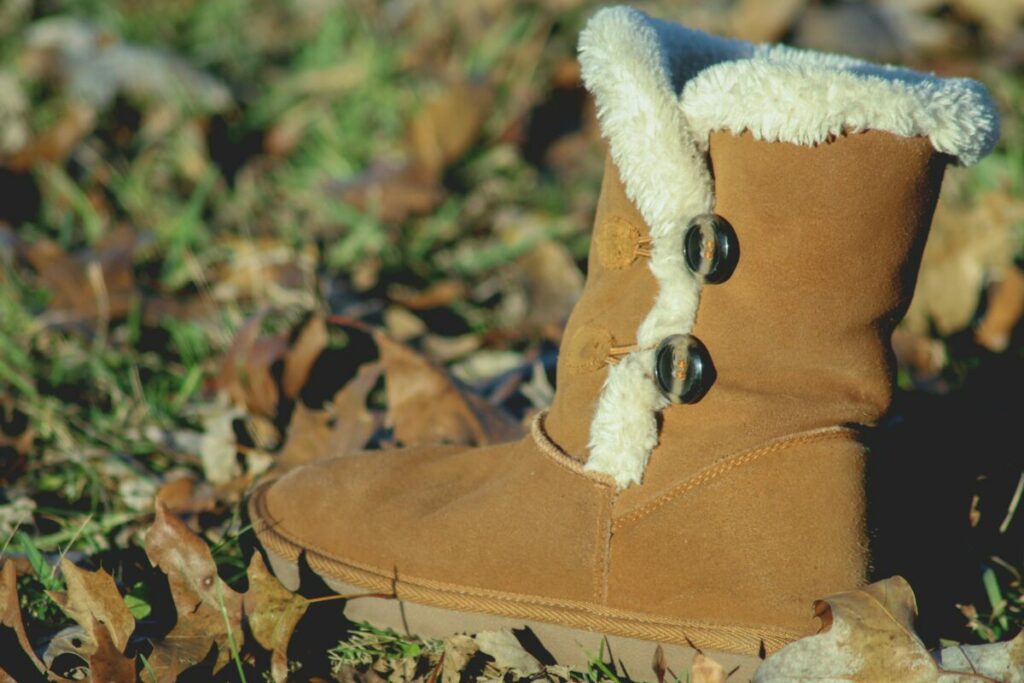 Photo of fleece lined boot sitting on leafy ground