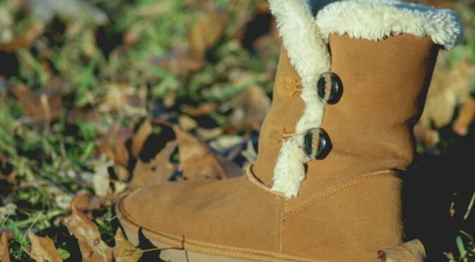 Photo of fleece lined boot sitting on leafy ground