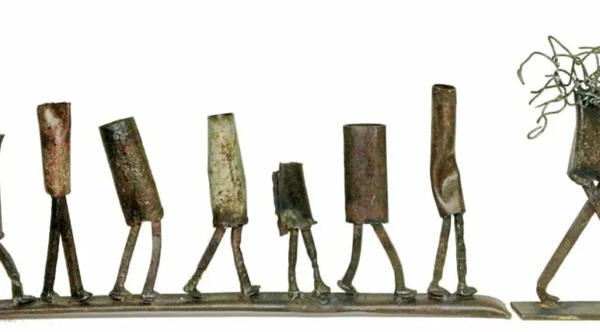 Sculpture of multiple rectangular shapes with legs