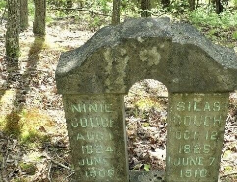 double column tombstone in woods