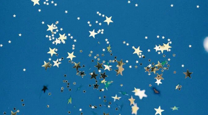Photo of glitter against blue background