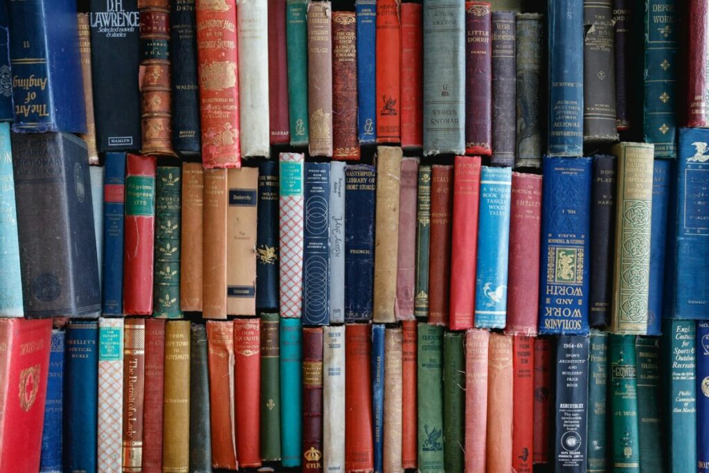 Photo of many books piled on top of each other