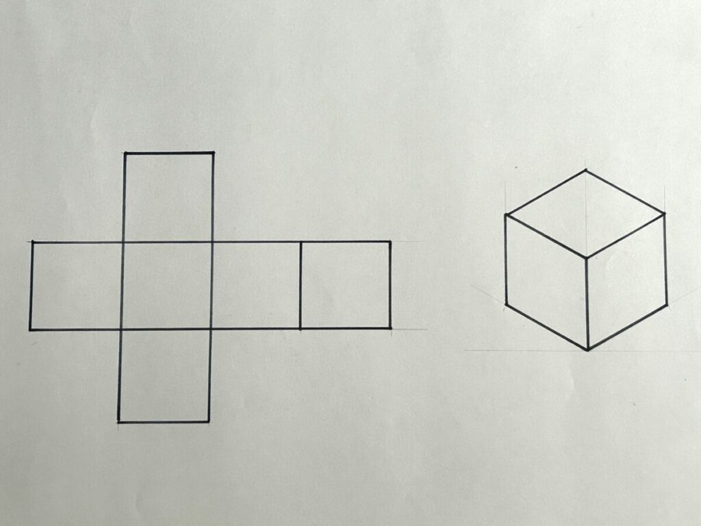 Photo of diagrams in pen on paper